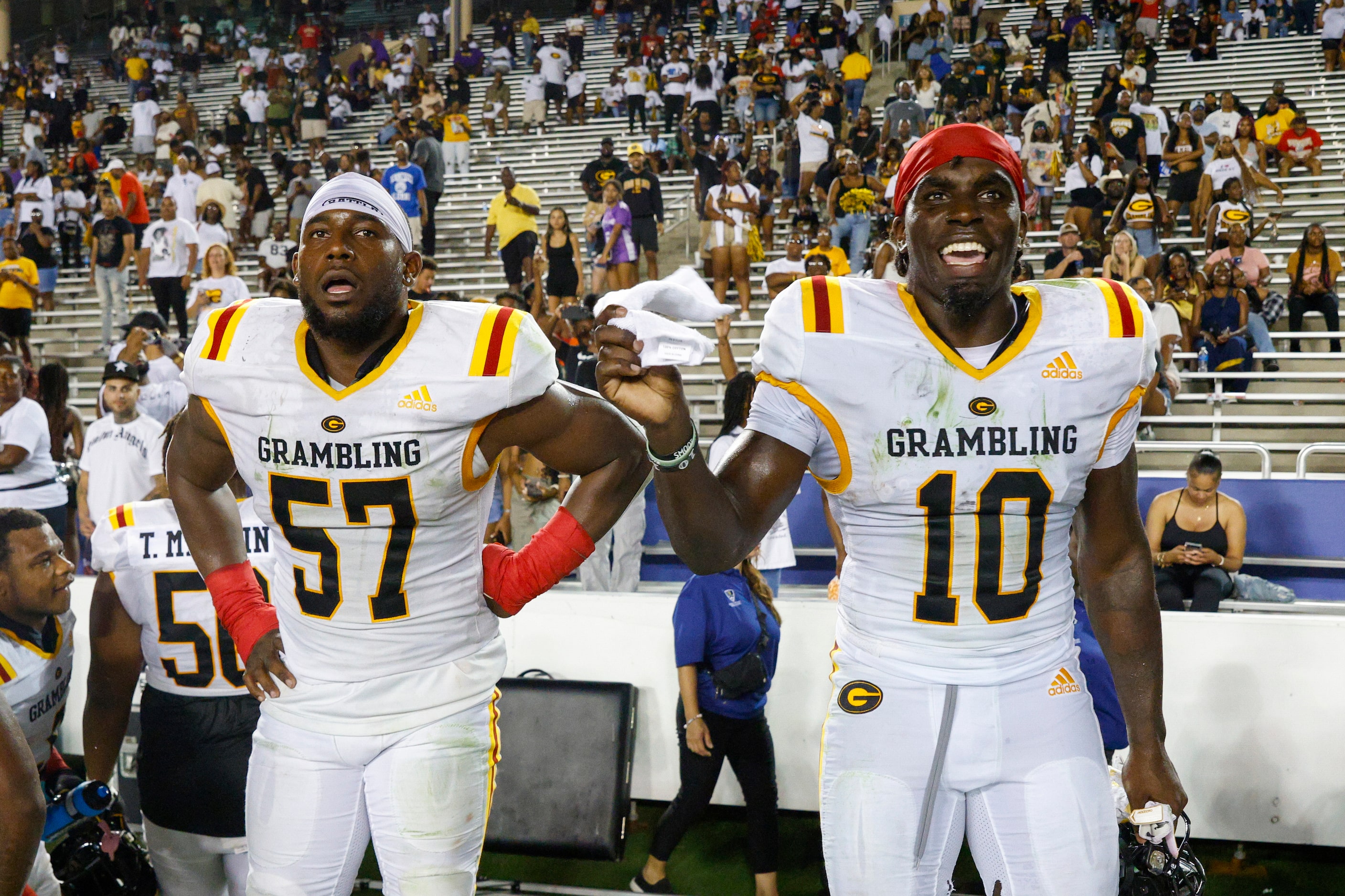 Grambling State linebacker Lewis Matthews (57) and wide receiver Lyndon Rash (10) celebrate...