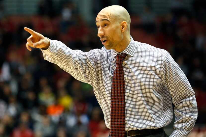 Dec 20, 2014; Cincinnati, OH, USA; Virginia Commonwealth Rams head coach Shaka Smart reacts...