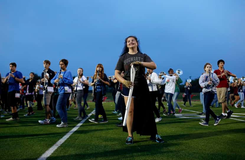 
The Allen High School marching band rehearses early in the morning at Allen High School....