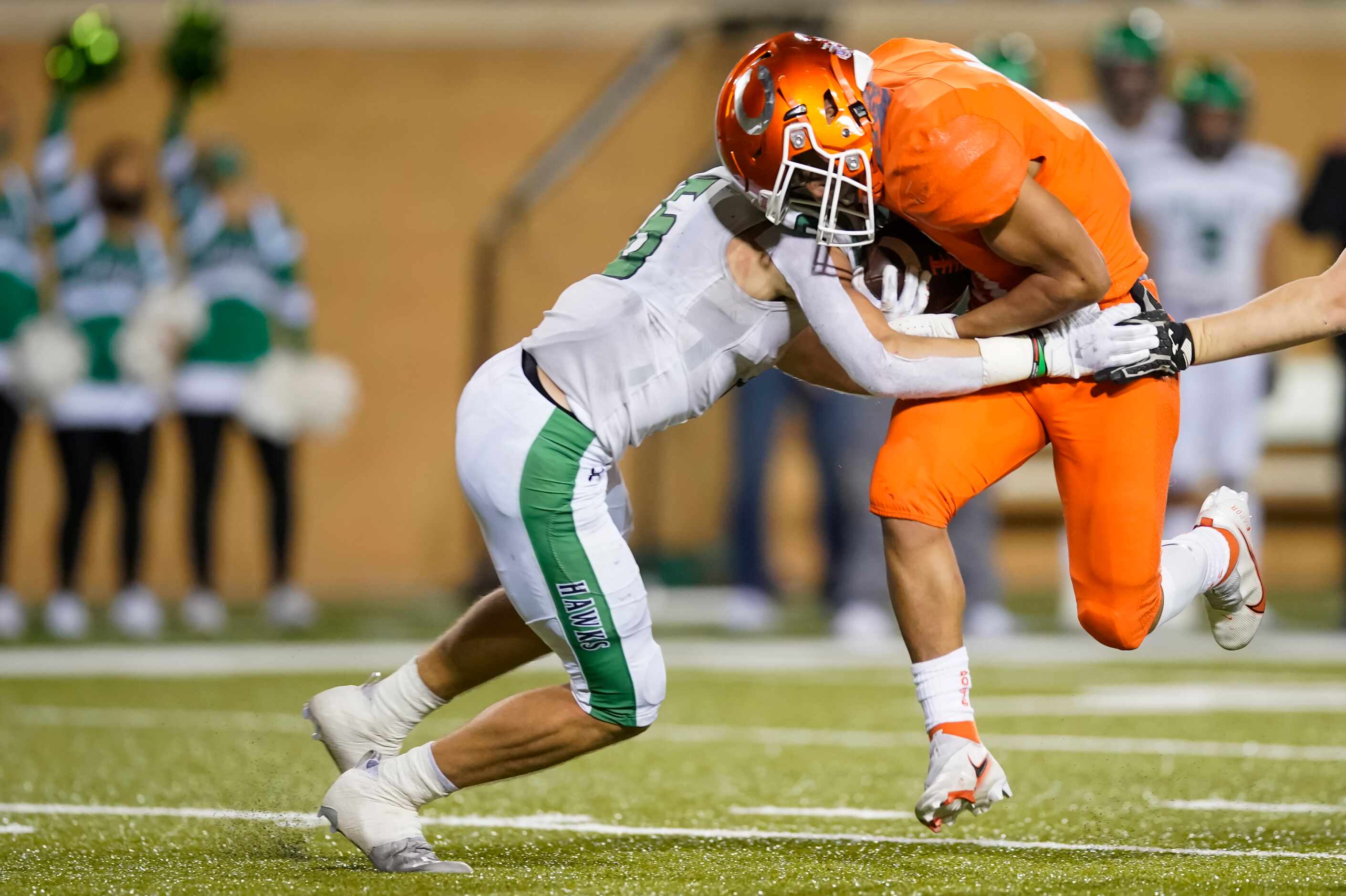 Celina running back  Gabe Gayton (11) is brought down by Iowa Park defensive back Connor...