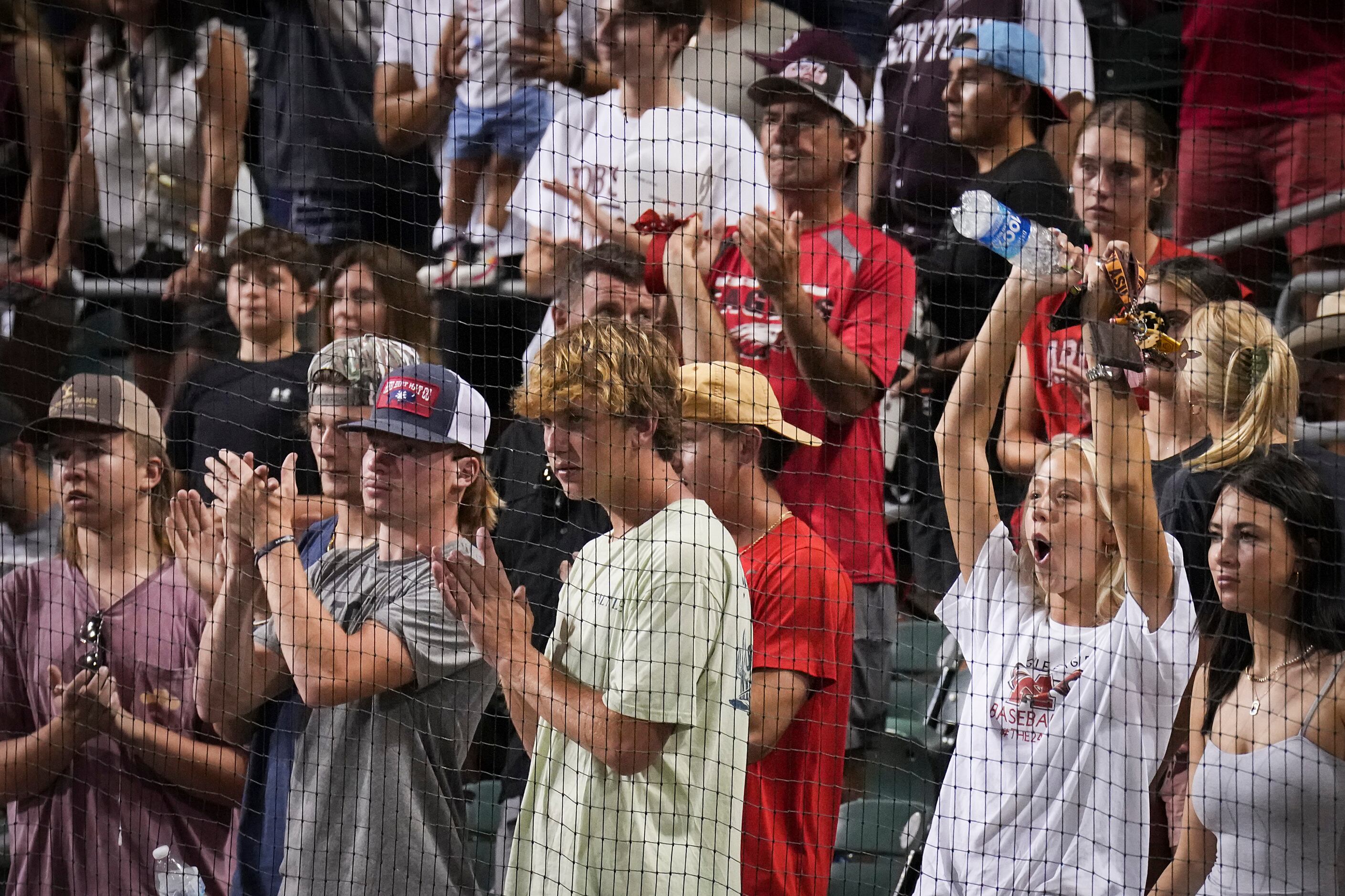 Argyle fans cheer their team after final out of a 9-0 loss to Sinton in the UIL 4A baseball...