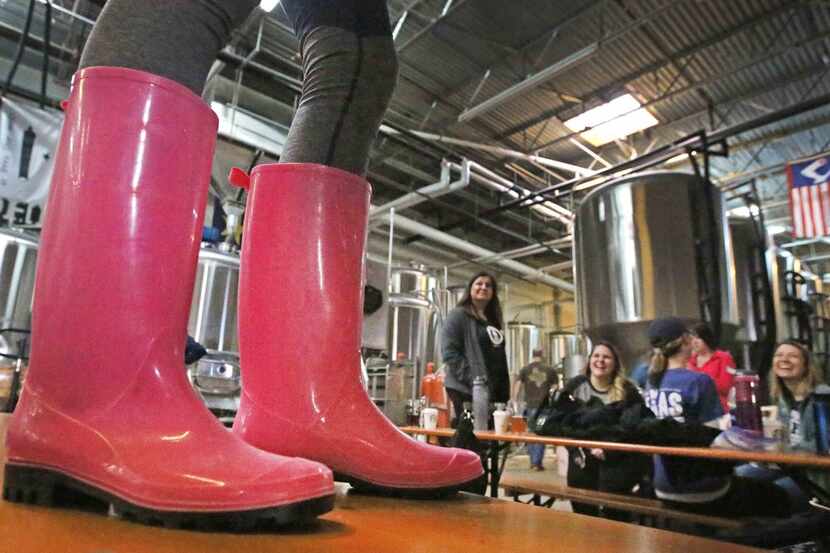 Members of the Northern Texas chapter of Pink Boots Society brews a batch of beer for...