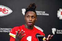 Kansas City Chiefs wide receiver Xavier Worthy talks to the media on the first day of the...