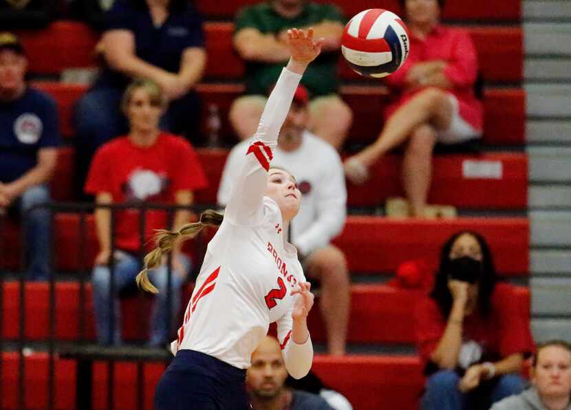 McKinney Boyd High School outside hitter Hannah Billeter (2) gets a hit during game one as...