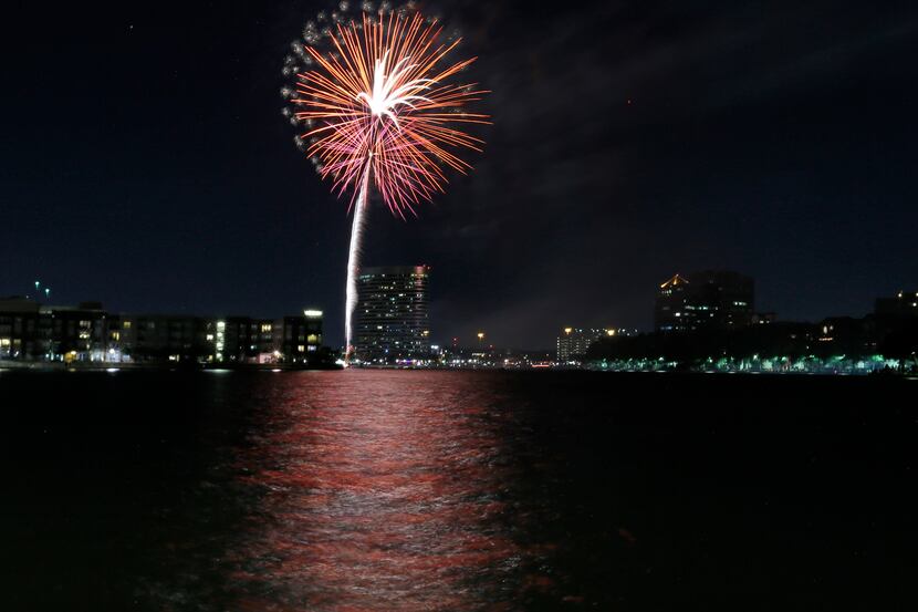 Fireworks light the night sky over Lake Carolyn in Irving in this file photo. Irving's...