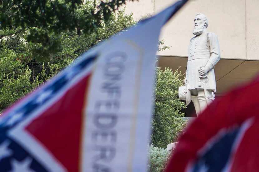 Confederate protesters made their voices heard during a Pioneer Park rally at which...