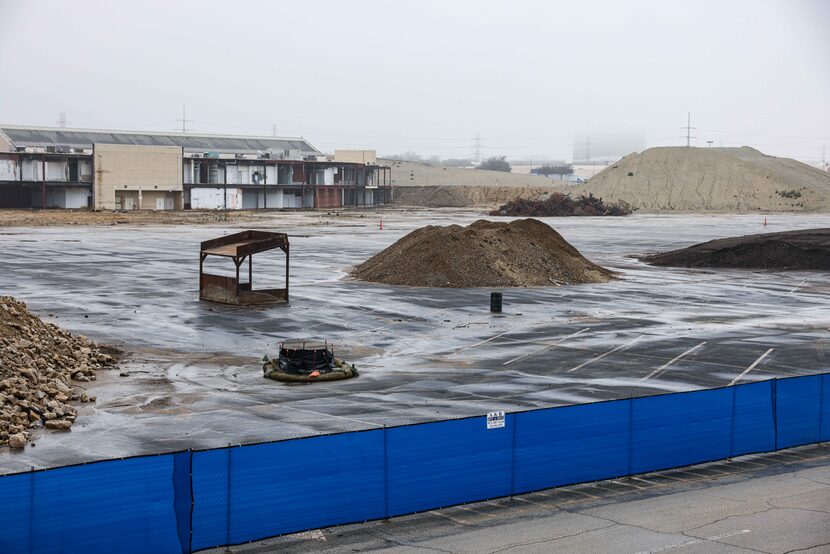 Most of the old retail buildings at Collin Creek Mall have been demolished. Work crews are...