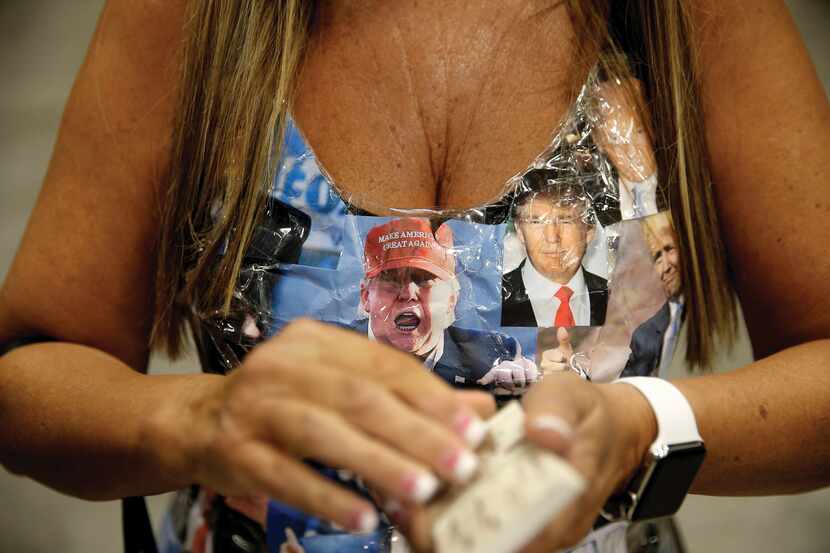 Barbara Tomasino of Plano wore her Donald Trump photo dress to a rally for the Republican...