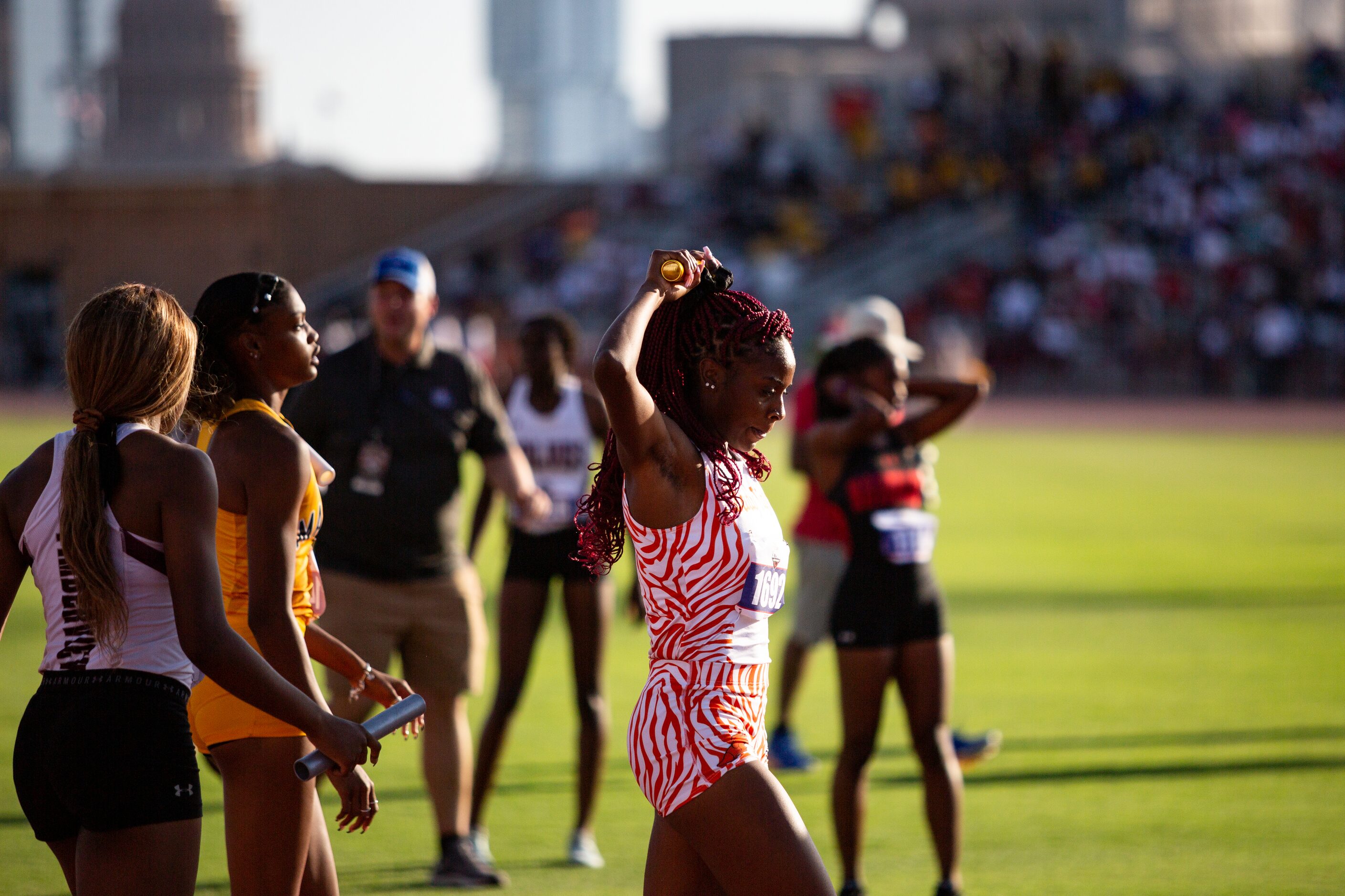 Lancaster’s Kelaiah Daniyan catches her breath after the girls’ 4x200 relay final at the UIL...