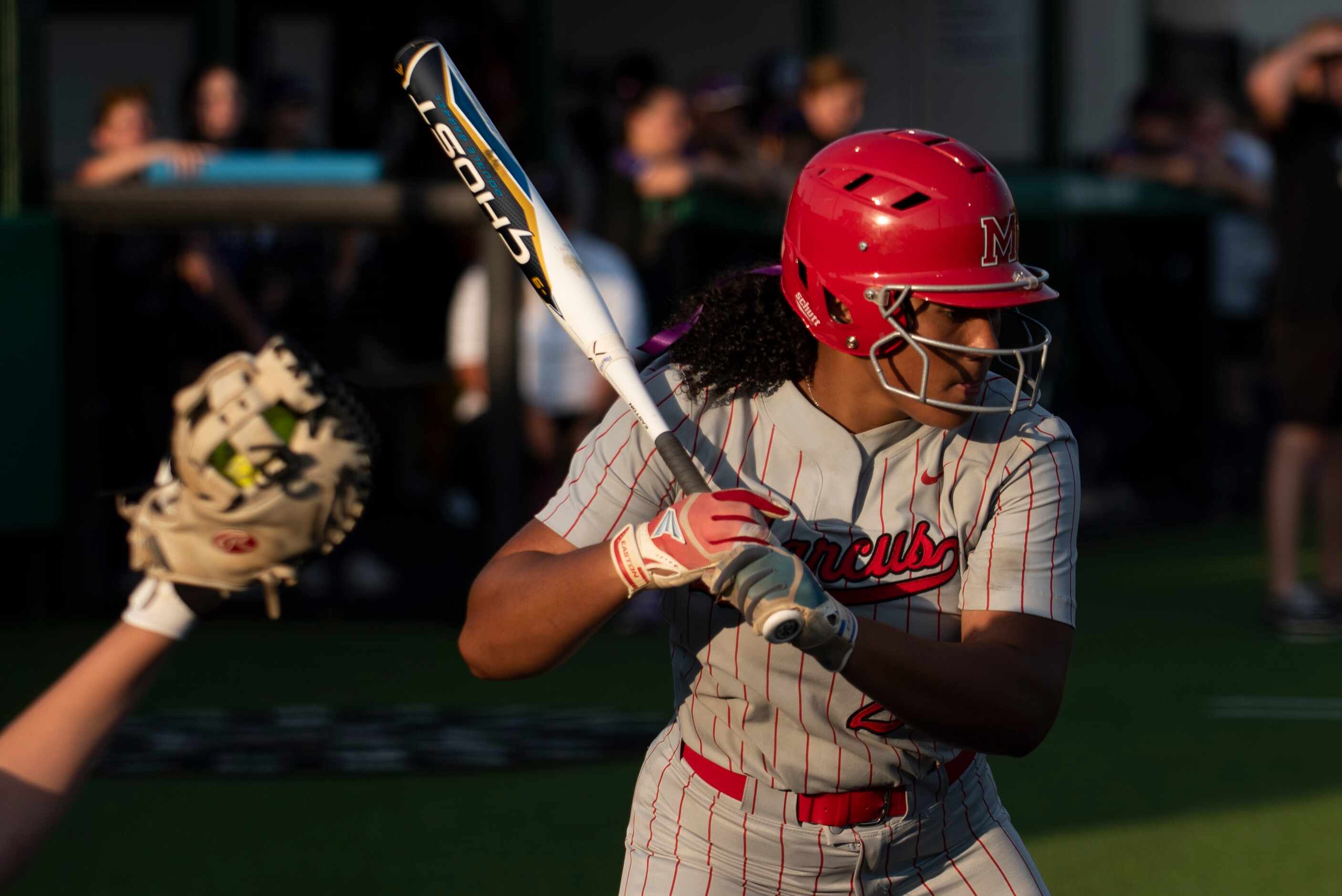 Flower Mound Marcus junior Tori Edwards (24) watches a pitch during Game One of the Class 6A...