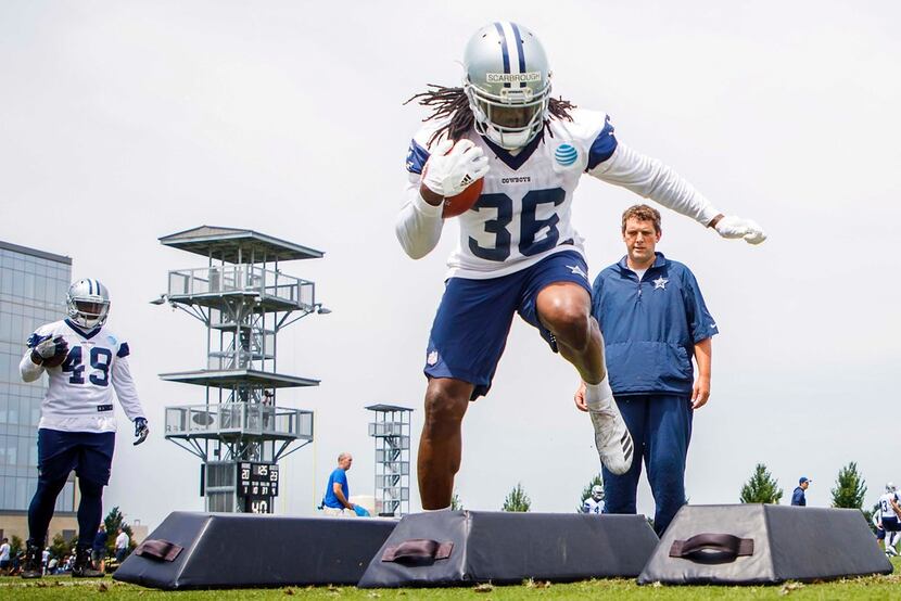 Cowboys running back Bo Scarbrough (36) runs a drill during minicamp at The Star on...