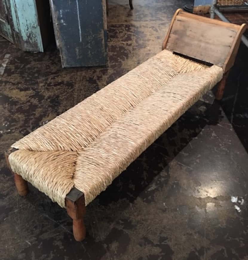 An 1880s primitive French recamier by Mike Turrentine is $3,400 retail at B Gover in Dallas...