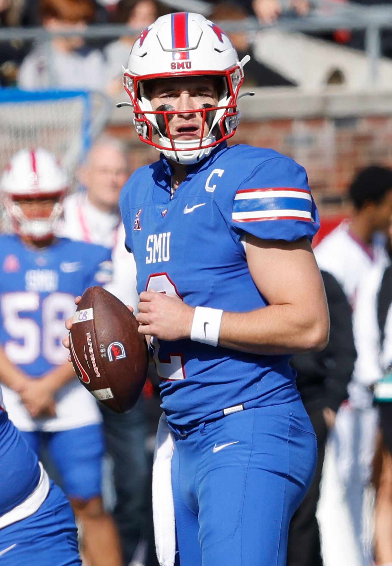 SMU quarterback Preston Stone (2) looks to throw the ball during the first half of an NCAA...