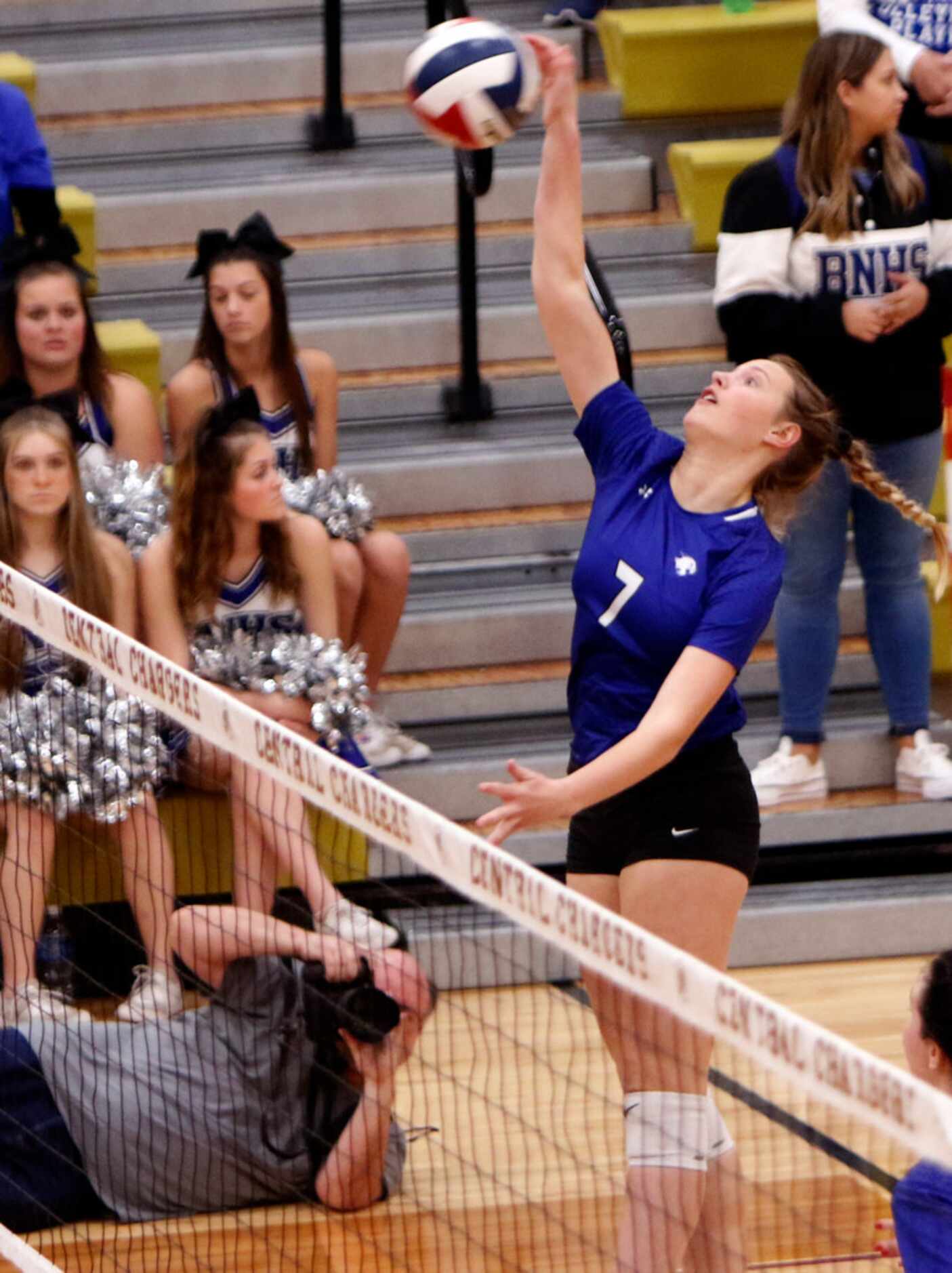 Trophy Club Byron Nelson outside hitter Nina Peterson (7) returns a shot during the first...