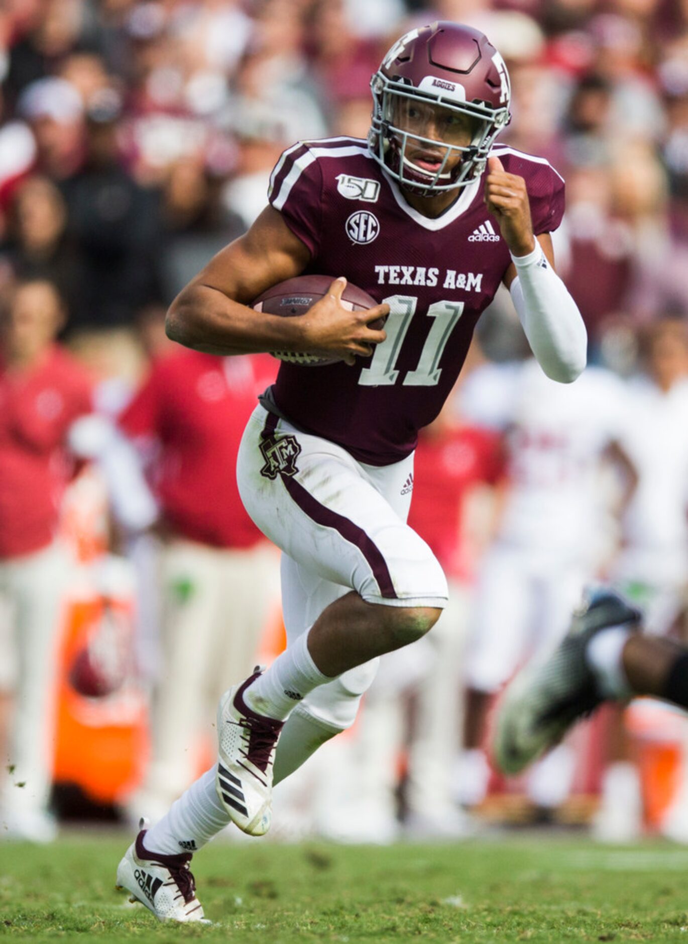 Texas A&M Aggies quarterback Kellen Mond (11) runs the ball during the second quarter of a...