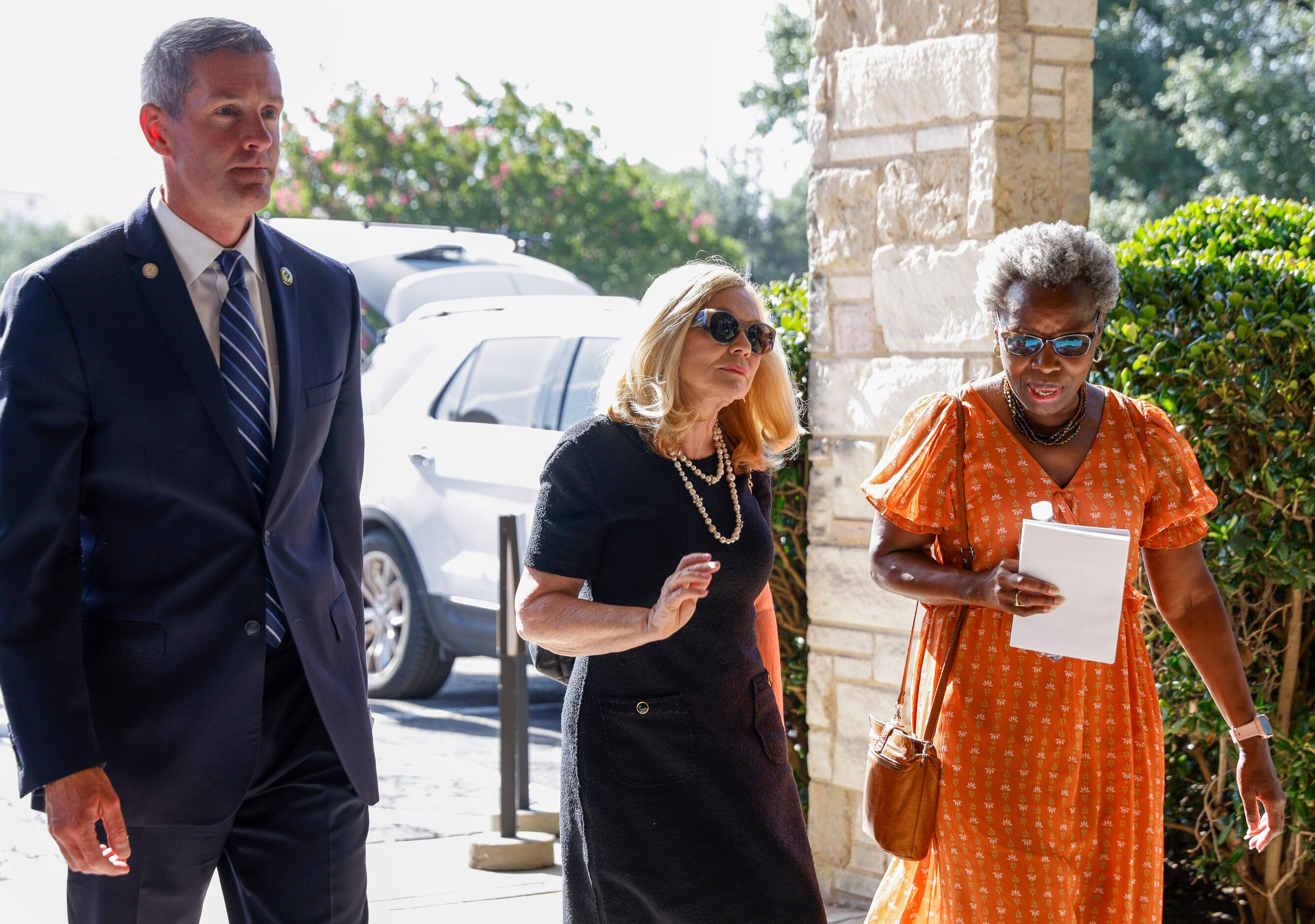 Dallas City Council member Chad West (left), Vicki Dodd, David Kunkle’s mother-in-law...