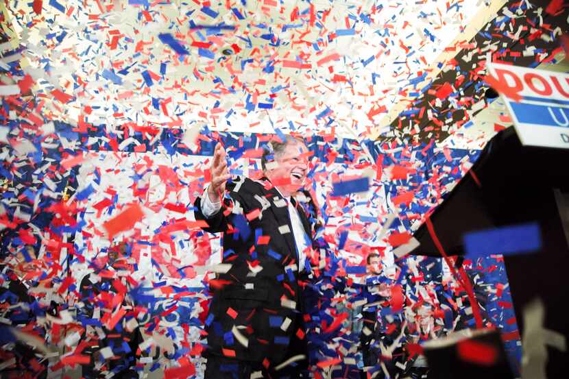 U. S. Sen.-elect Doug Jones celebrates during his watch party Tuesday in Birmingham, Ala.....