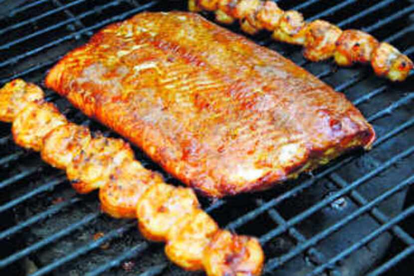  Ches Williams uses a recipe for smoky salmon created by his friend Kurt Hagen, and grills...