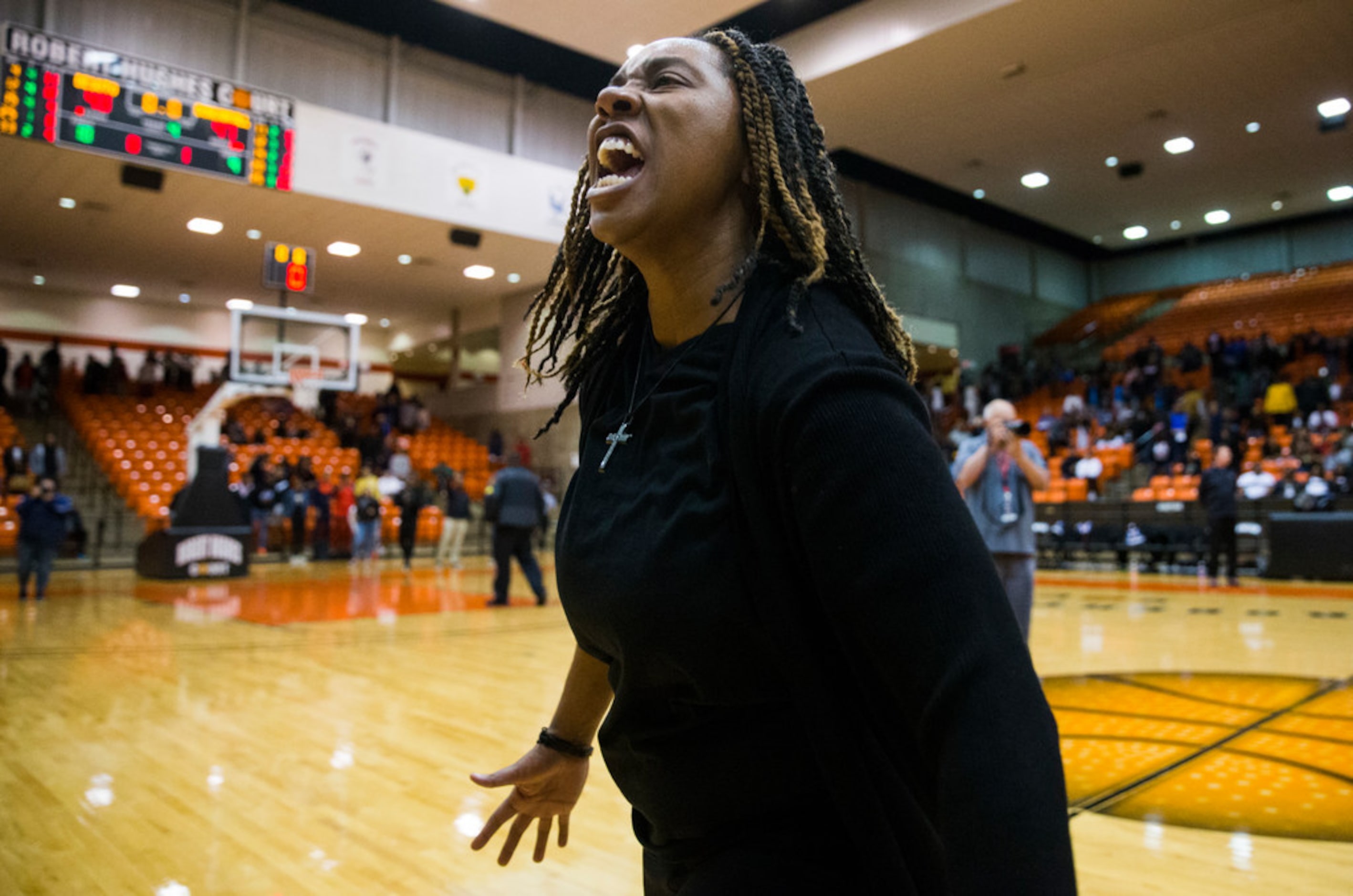 Duncanville head coach LaJeanna Howard celebrates a 47-43 win after a Class 6A Region I...