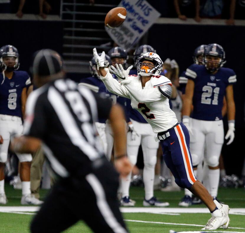 Frisco Wakeland High WR Louis Blount (2) fields a pass for a first down during the second...