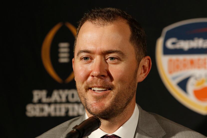 Oklahoma head coach Lincoln Riley speaks at an NCAA college football news conference in Fort...