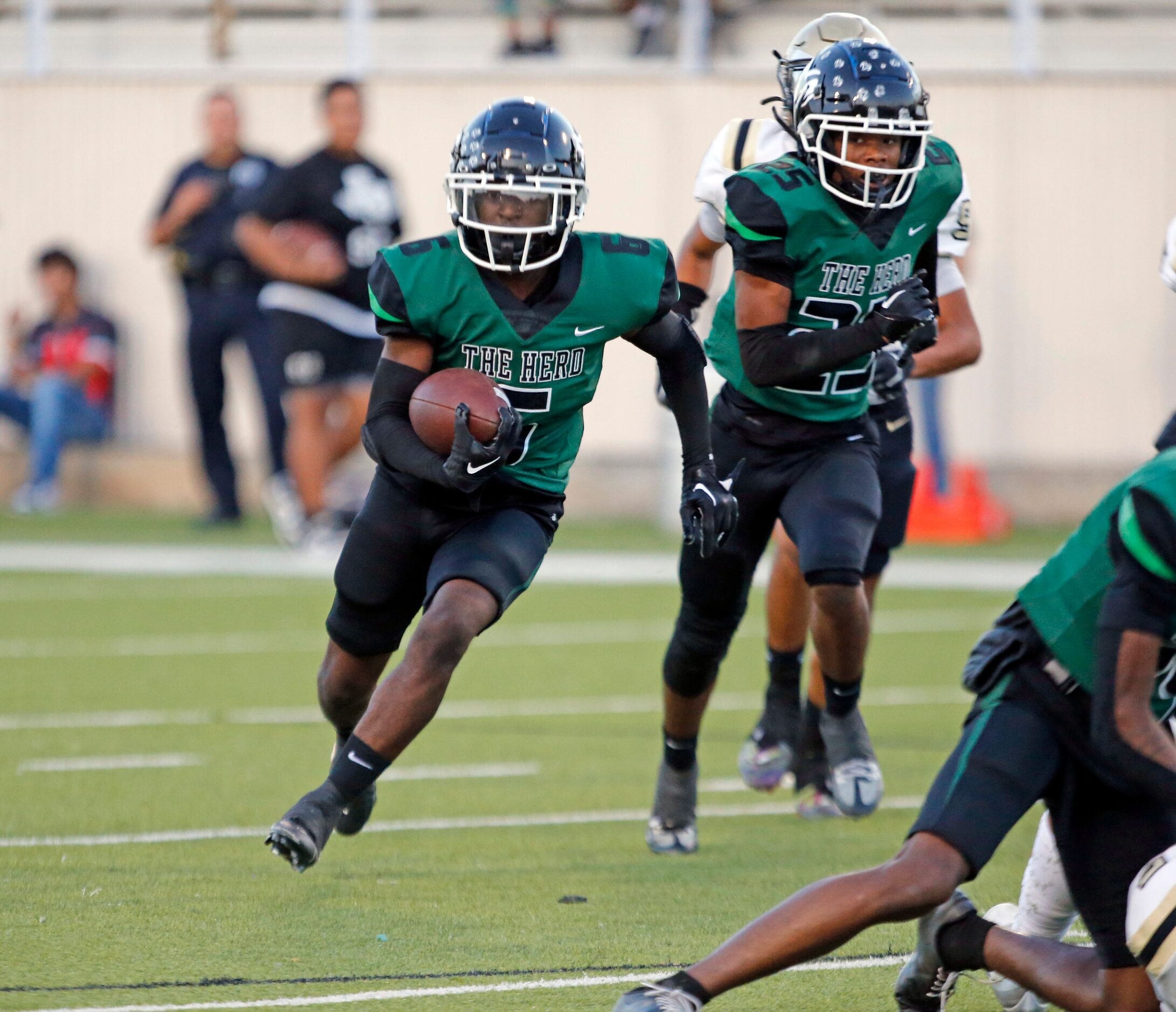 Richardson Berkner high’s Dameon Crowe (6) runs the ball during the first half of a high...