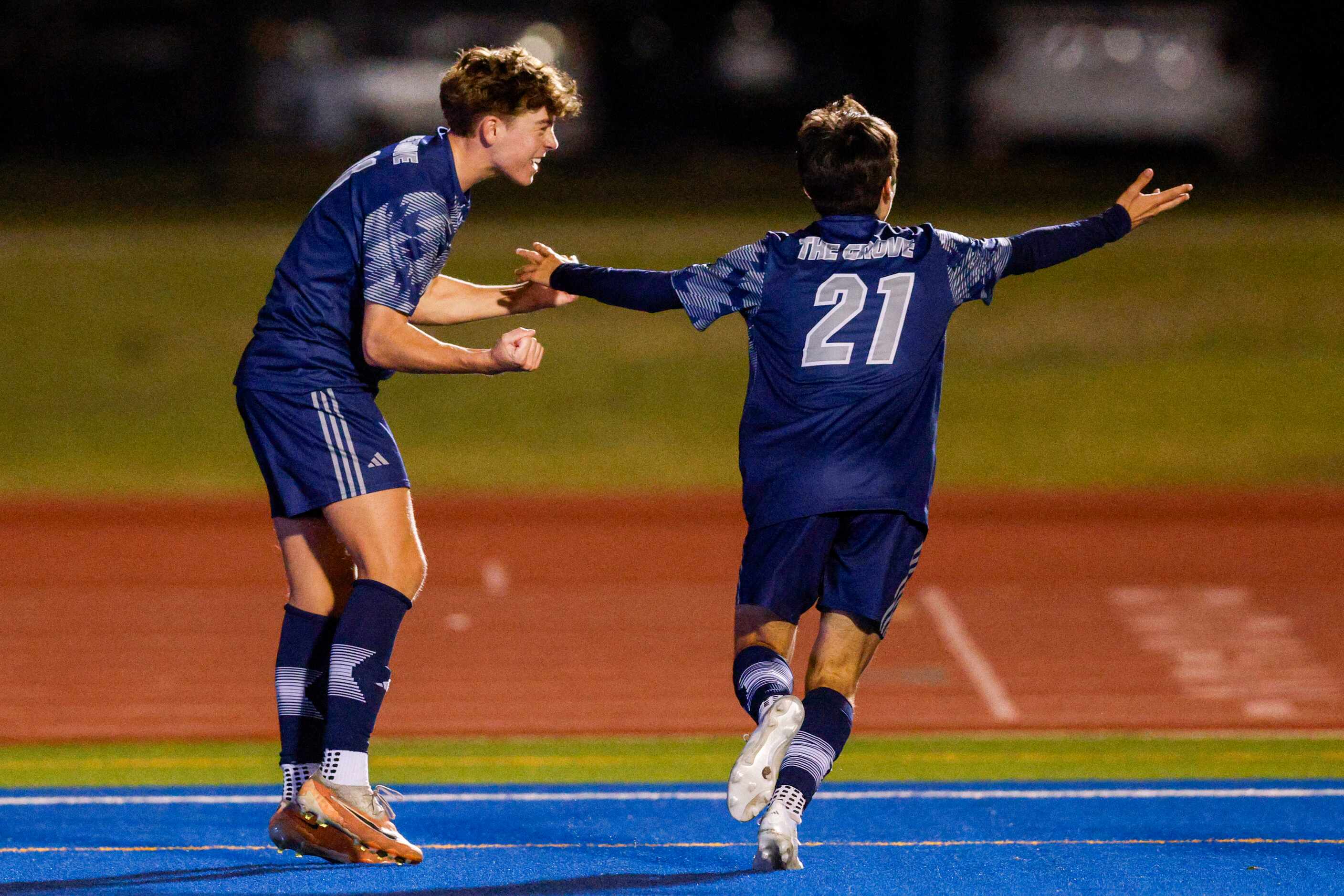 Prosper Walnut Grove midfielder Carter Causey (11) celebrates a goal by defender Preston...