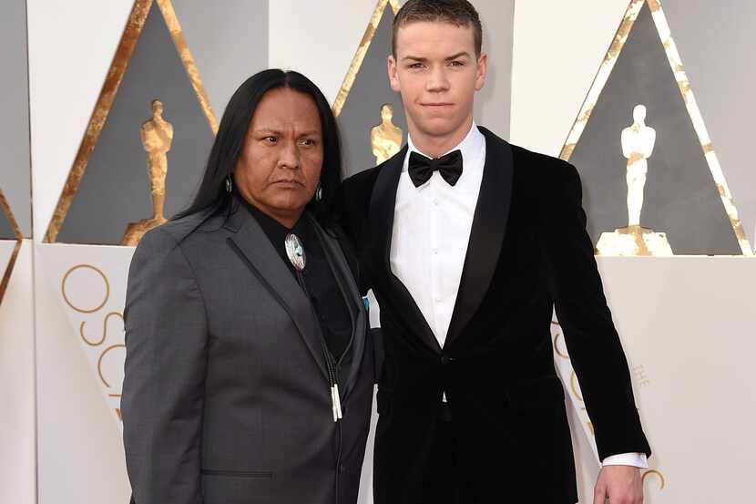 Arthur Redcloud, left, and Will Poulter arrive at the Oscars on Sunday, Feb. 28, 2016, at...