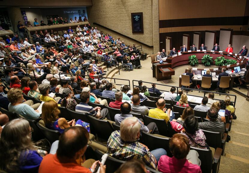 A large audience looked on during a joint meeting of the Plano City Council and the Planning...
