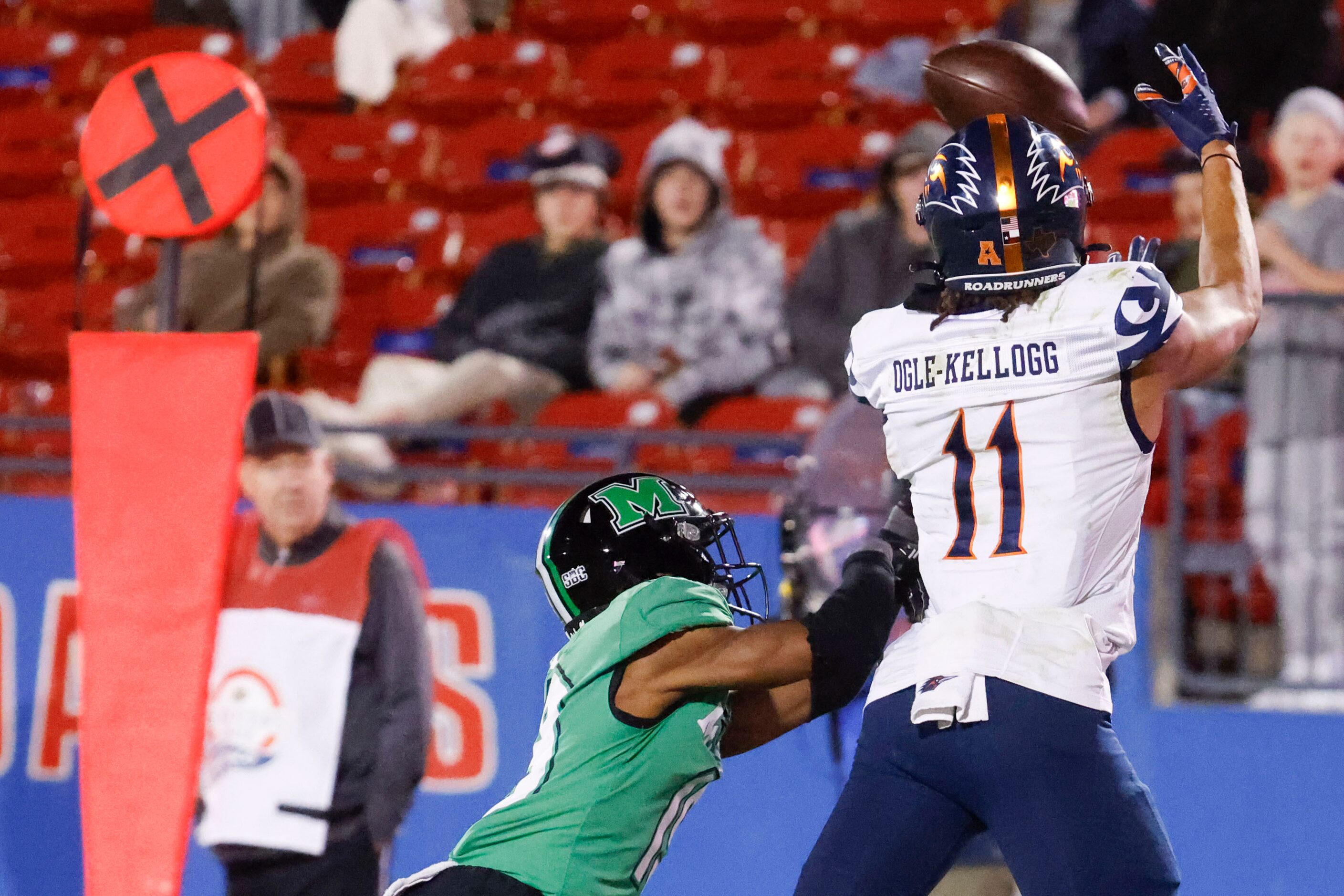 Marshall defensive back Dyoni Hill (left) reaches to tackle as UTSA wide receiver Tykee...