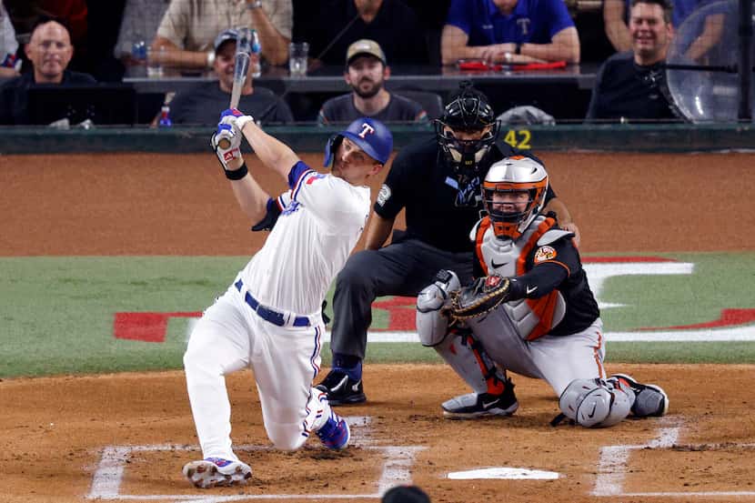 Texas Rangers shortstop Corey Seager (5) hits a home run off of Baltimore Orioles starting...