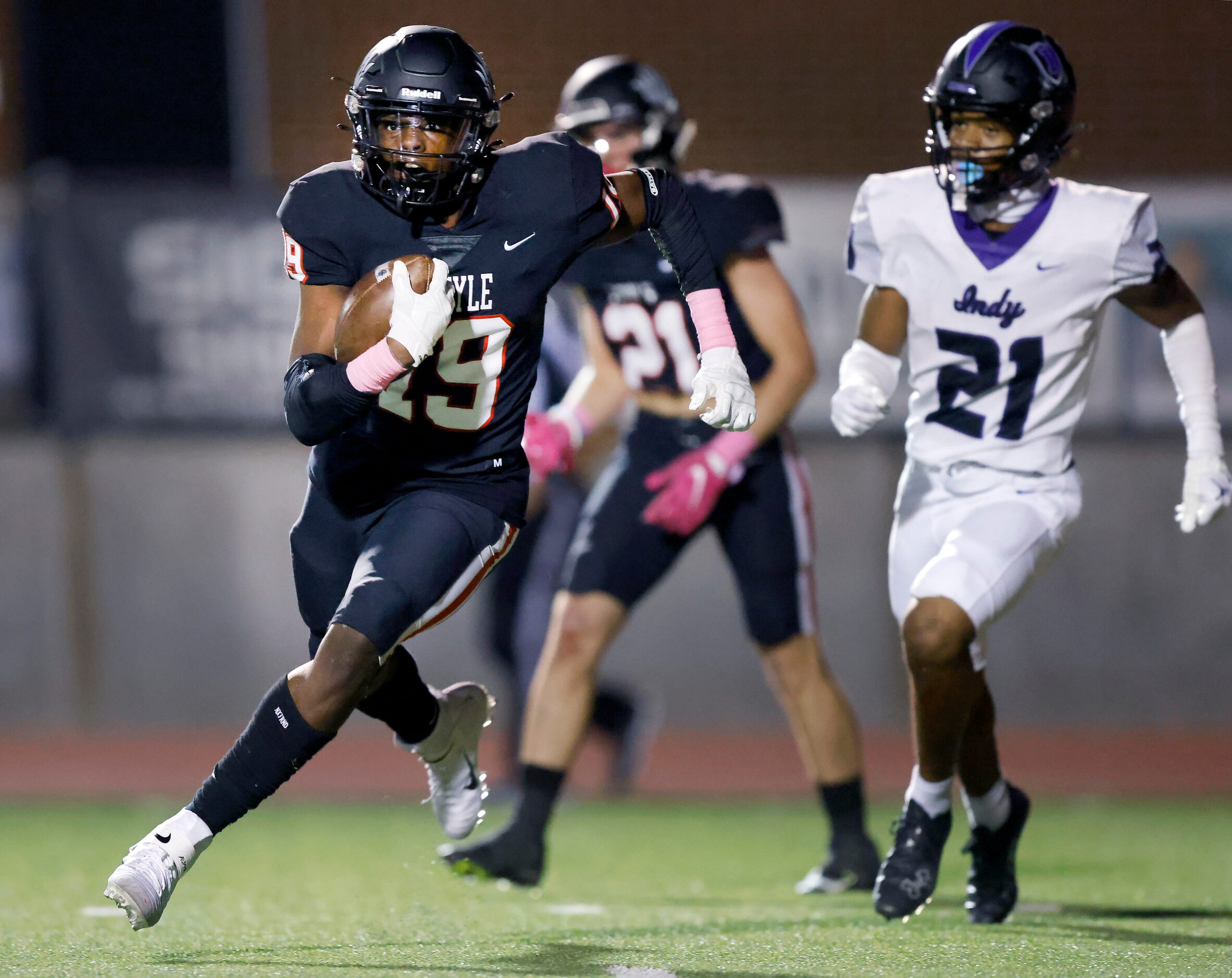 Argyle defensive back Jaaqwan Felton (21) returns an interception from the end zone which...