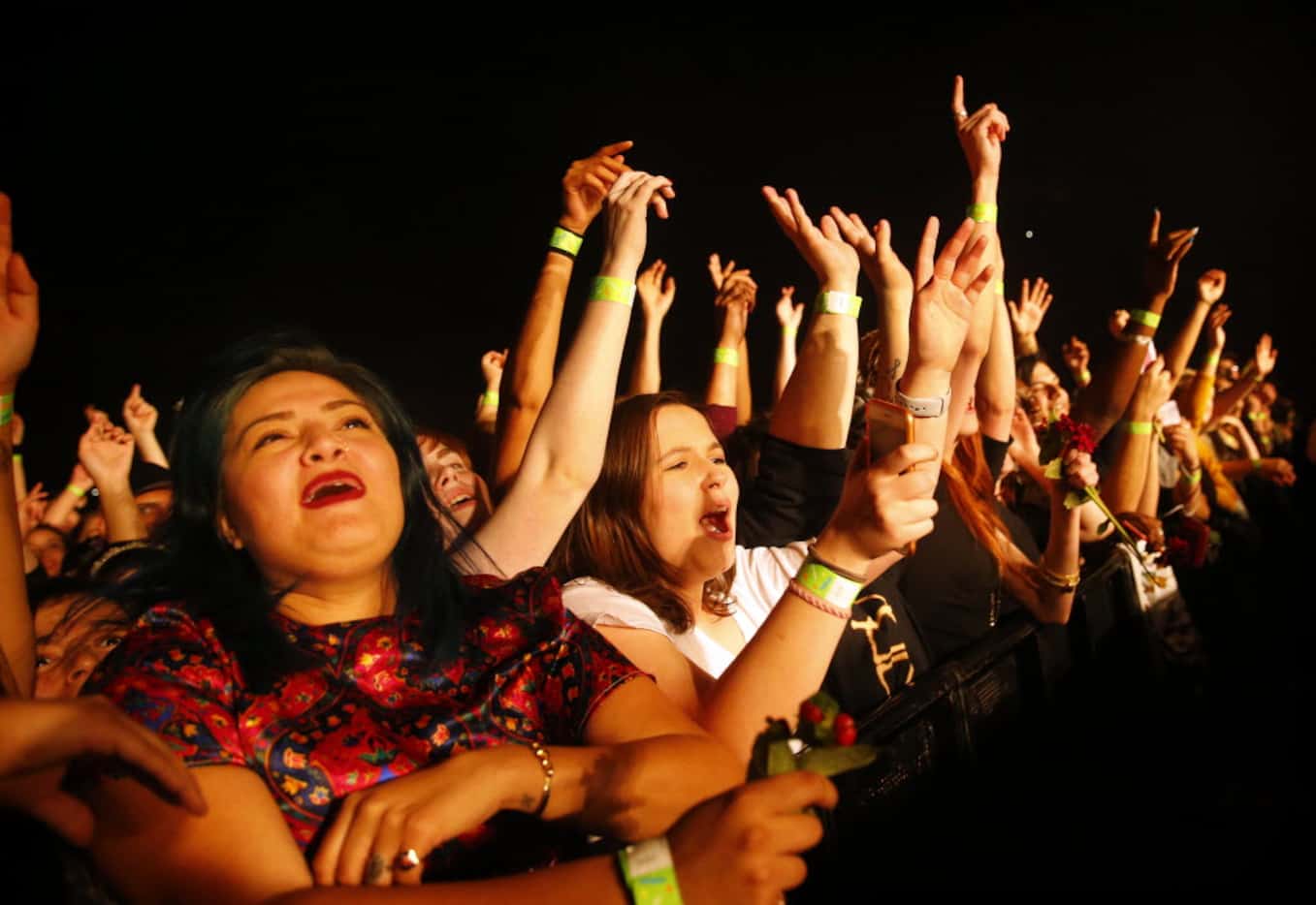 Fans react to the opening number by English musician Florence Welch of Florence and the...