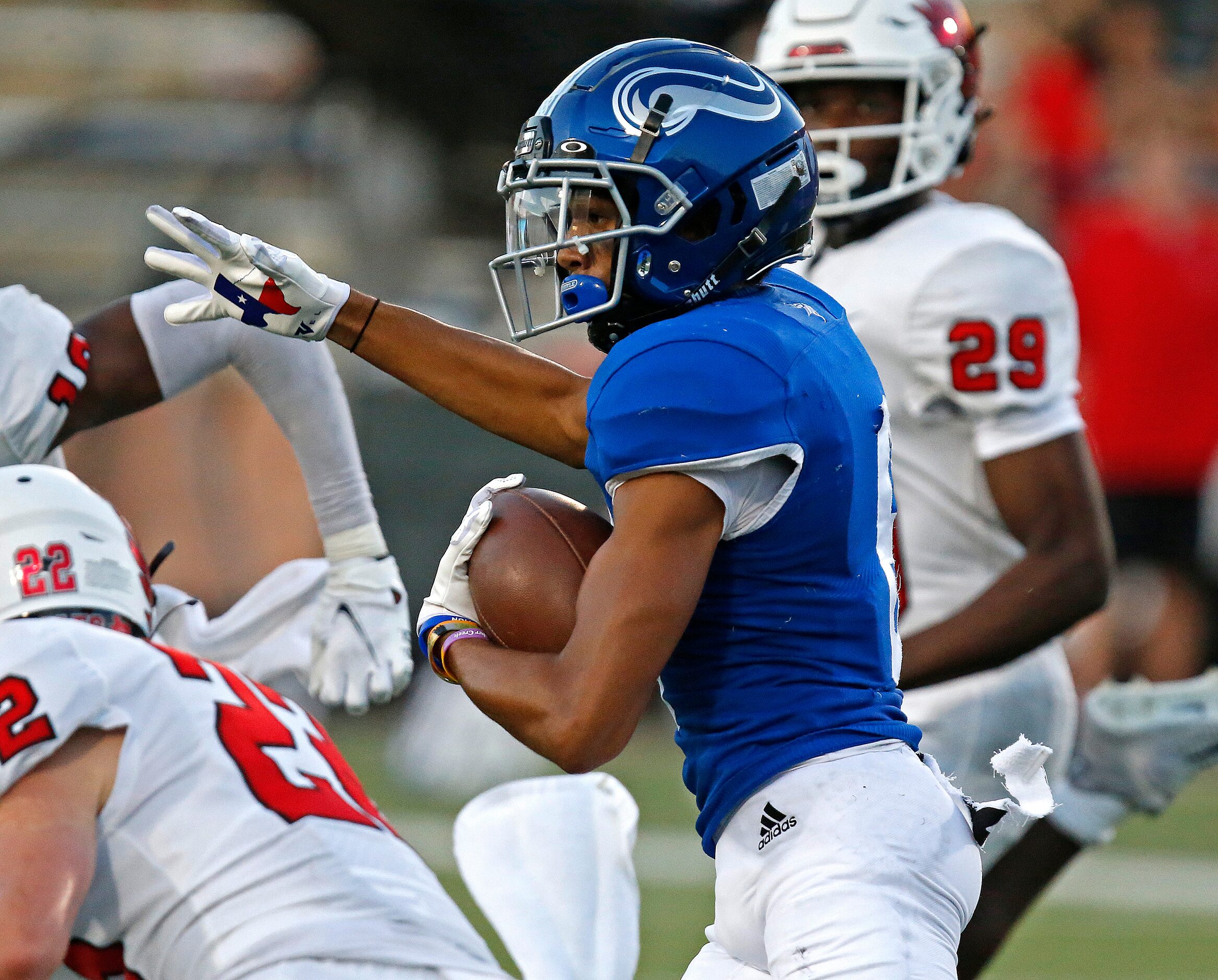 Nolan Catholic High School wide receiver Jaiden Burnett (6) runs after the catch during the...