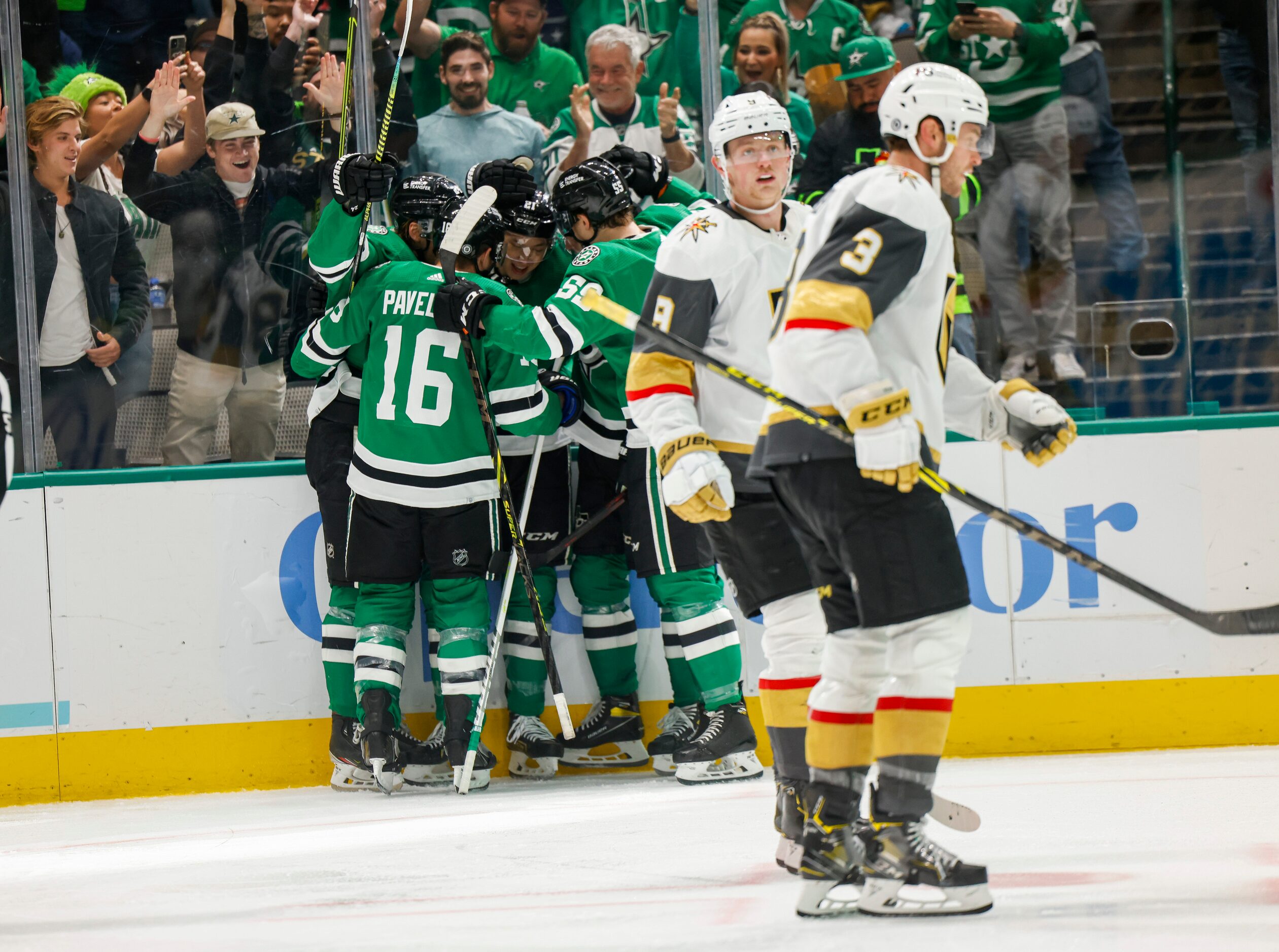 Dallas Stars left wing Jason Robertson (21) and teammates celebrate scoring against Vegas...