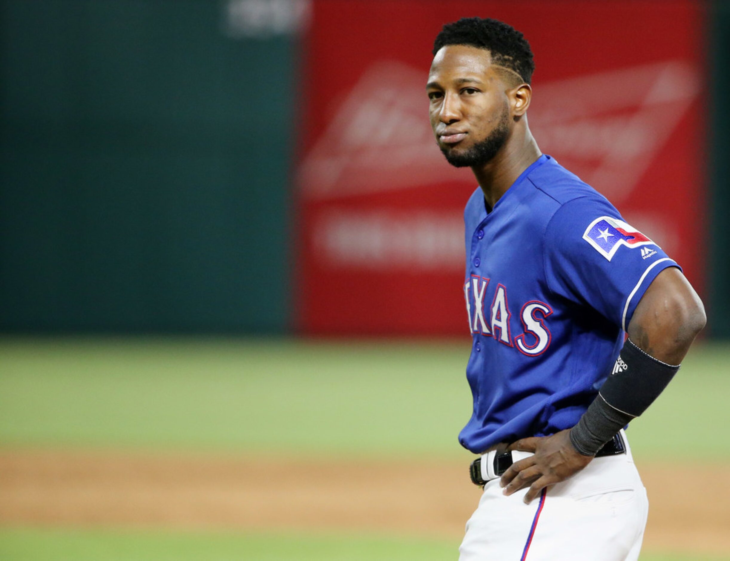 Texas Rangers shortstop Jurickson Profar (19) reacts after grounding out to end the eighth...