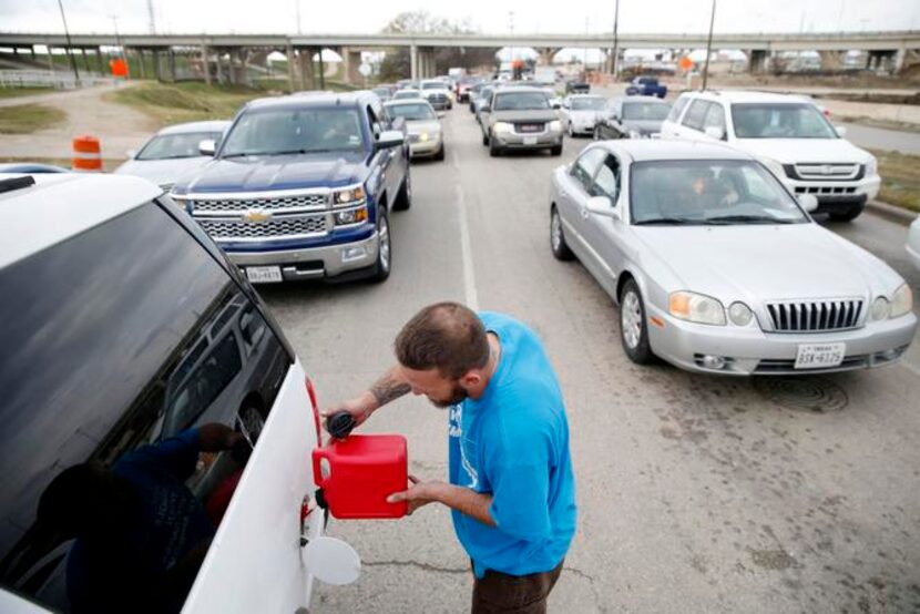 
Phillip Thornton of Highland Village couldn’t wait any longer as the line for...