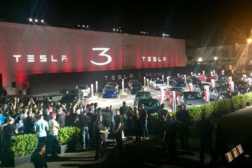 Tesla Model 3 owners await their cars in Fremont, California on July 28, 2017. 