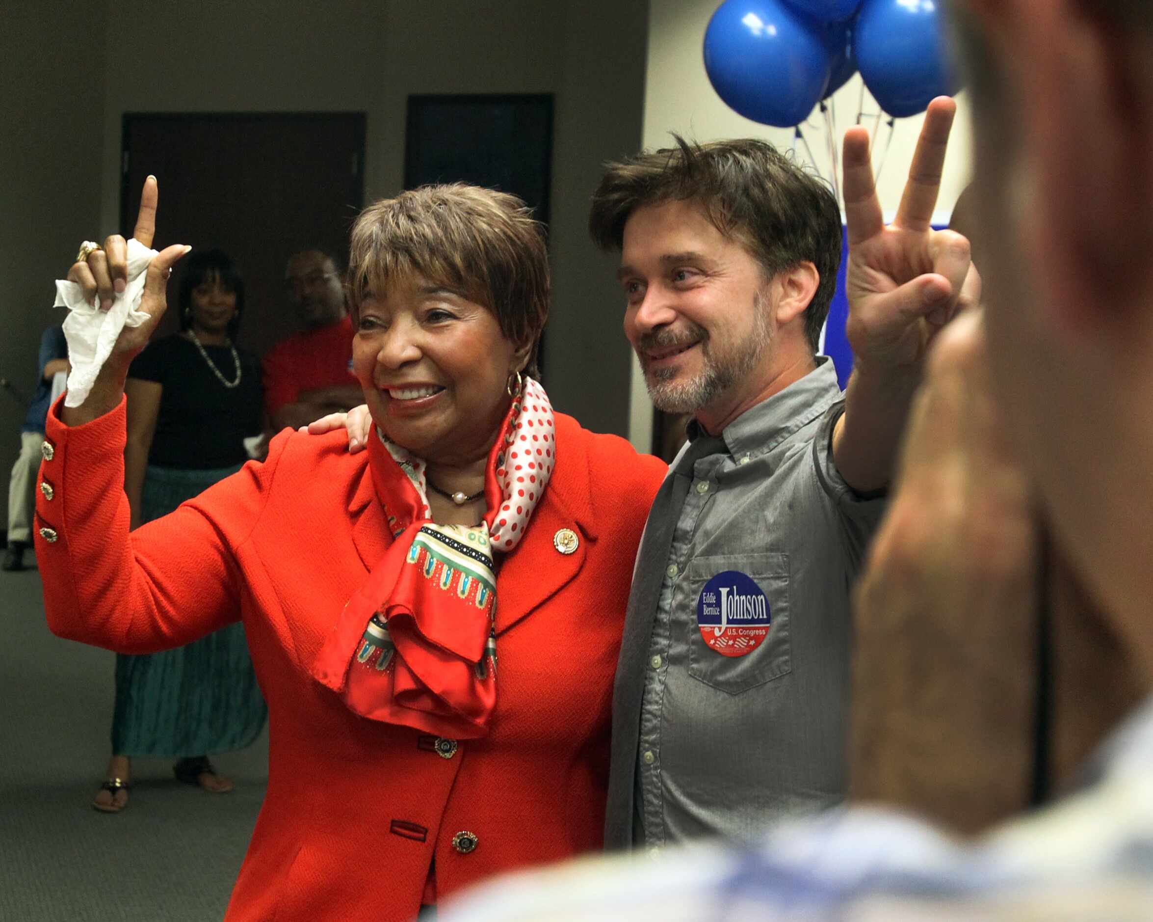U.S. Representative Eddie Bernice Johnson celebrates with her campaign manager Michael...