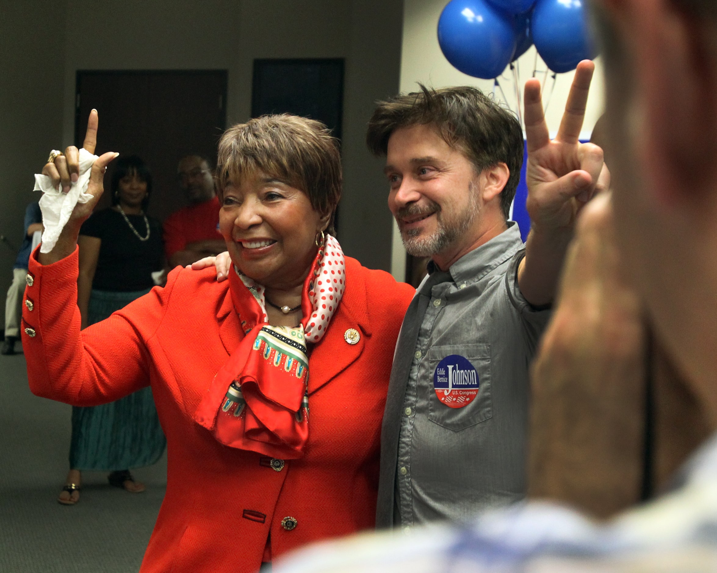 U.S. Representative Eddie Bernice Johnson celebrates with her campaign manager Michael...