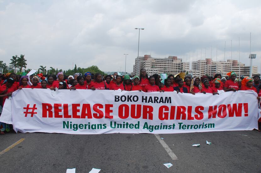 In this Monday, May 26, 2014, photo, the Nigerians United Against Terrorism group attends a...
