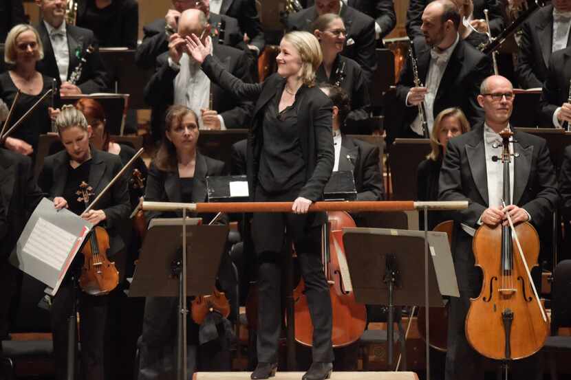 Conductor Ruth Reinhardt turns the audience after the third movement of Lutoslawski's...