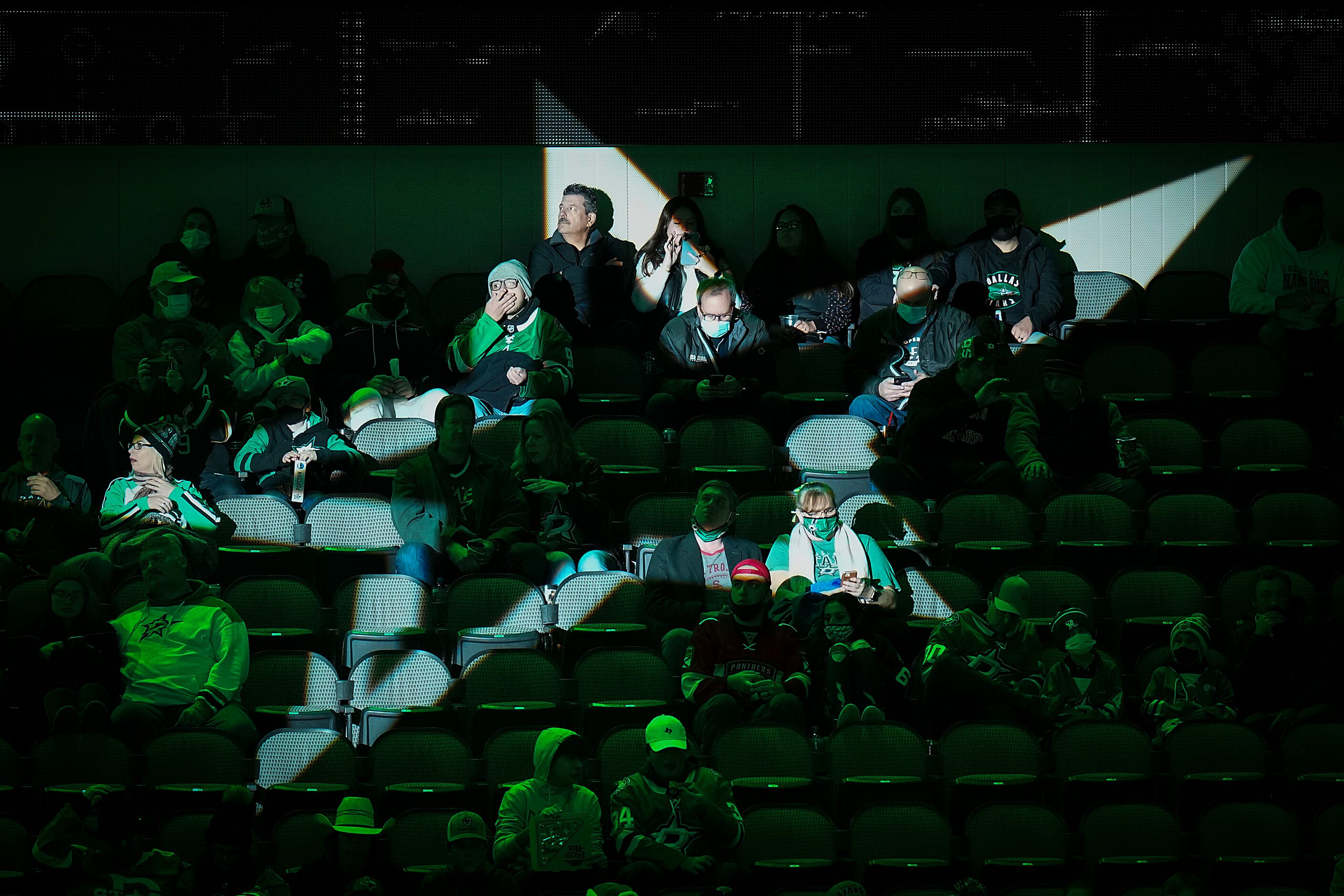 Dallas Stars fans take their seats before an NHL hockey game against the Florida Panthers at...