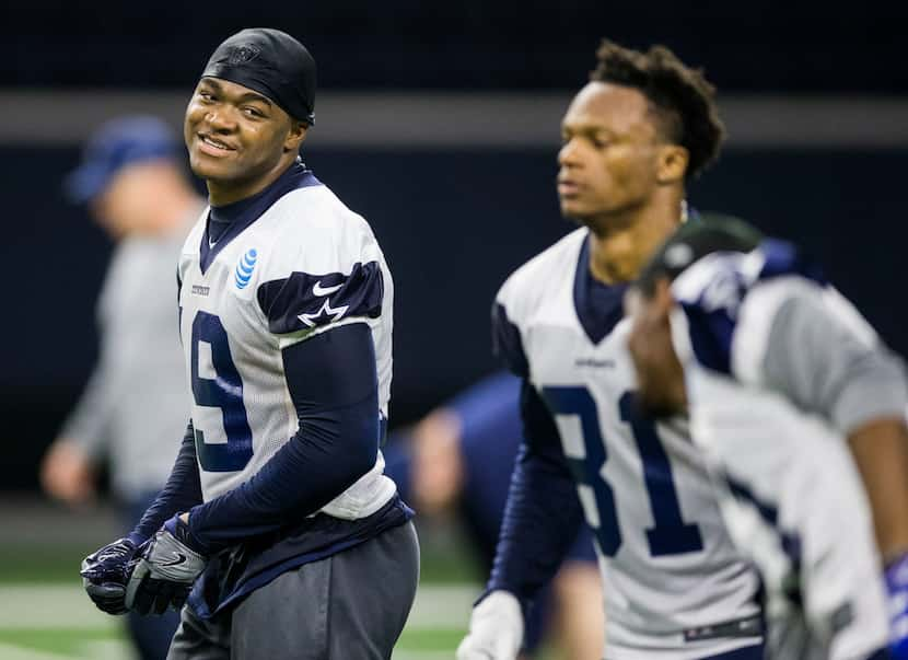 Dallas Cowboys wide receiver Amari Cooper (19) smiles during a Dallas Cowboys OTA practice...