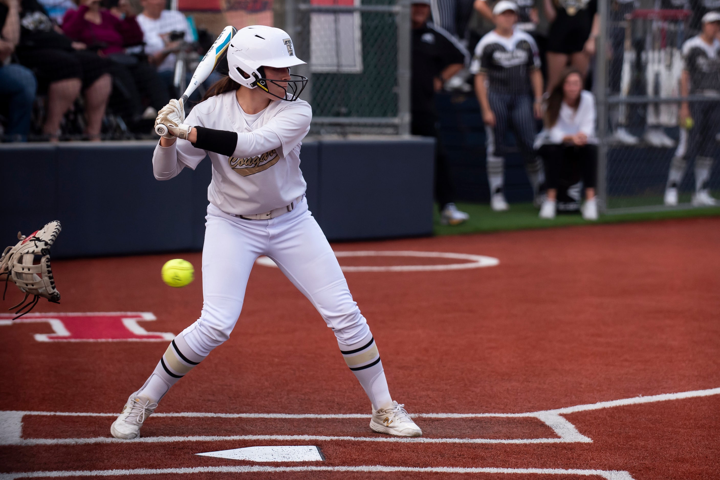 The Colony’s Sydney Young (6) watches a pitch during game two of the Class 5A Softball...