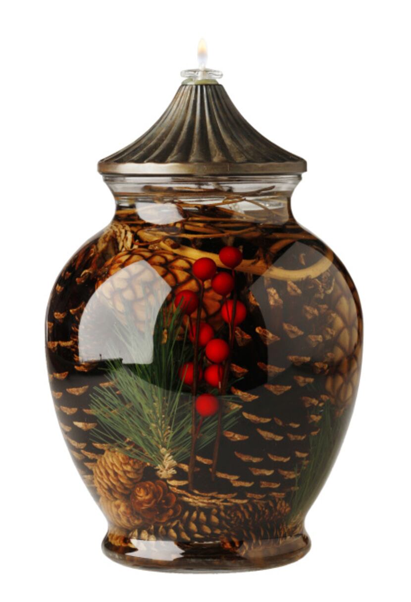Warm hearth and home with a nature-inspired, ginger jar oil lamp. Filled with preserved...