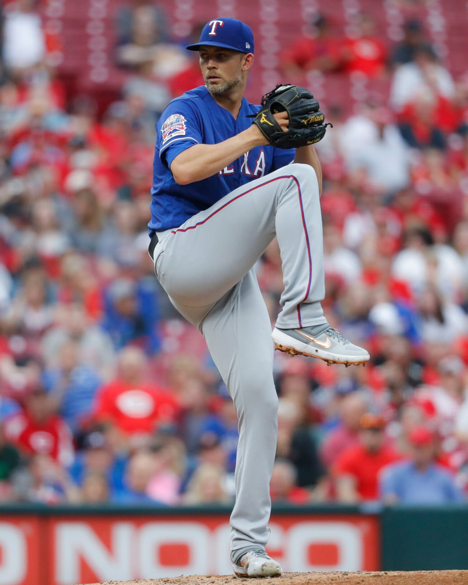 Texas Rangers starting pitcher Mike Minor throws in the first inning of a baseball game...