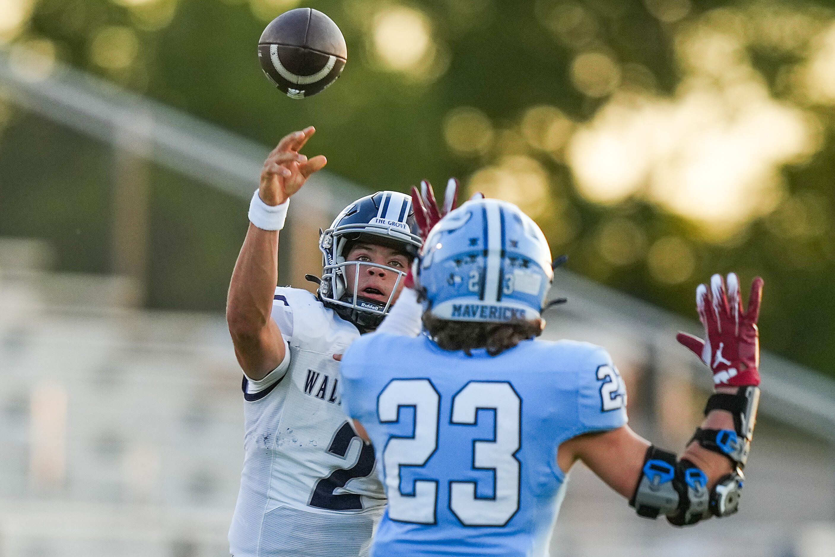 Prosper Walnut Grove quarterback Hayes Hackney (2) throws a pass over Frisco Emerson...