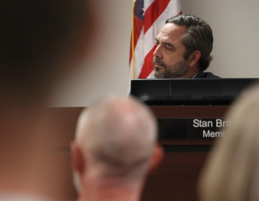 Board member Stan Britton listens during a Rockwall ISD School Board special session  on...