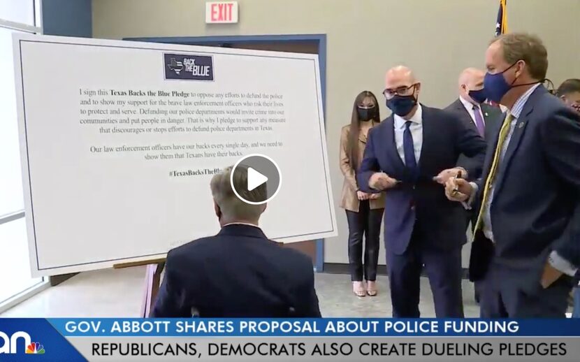 Gov. Greg Abbott, back to camera, with Speaker Dennis Bonnen, center, and Attorney General...